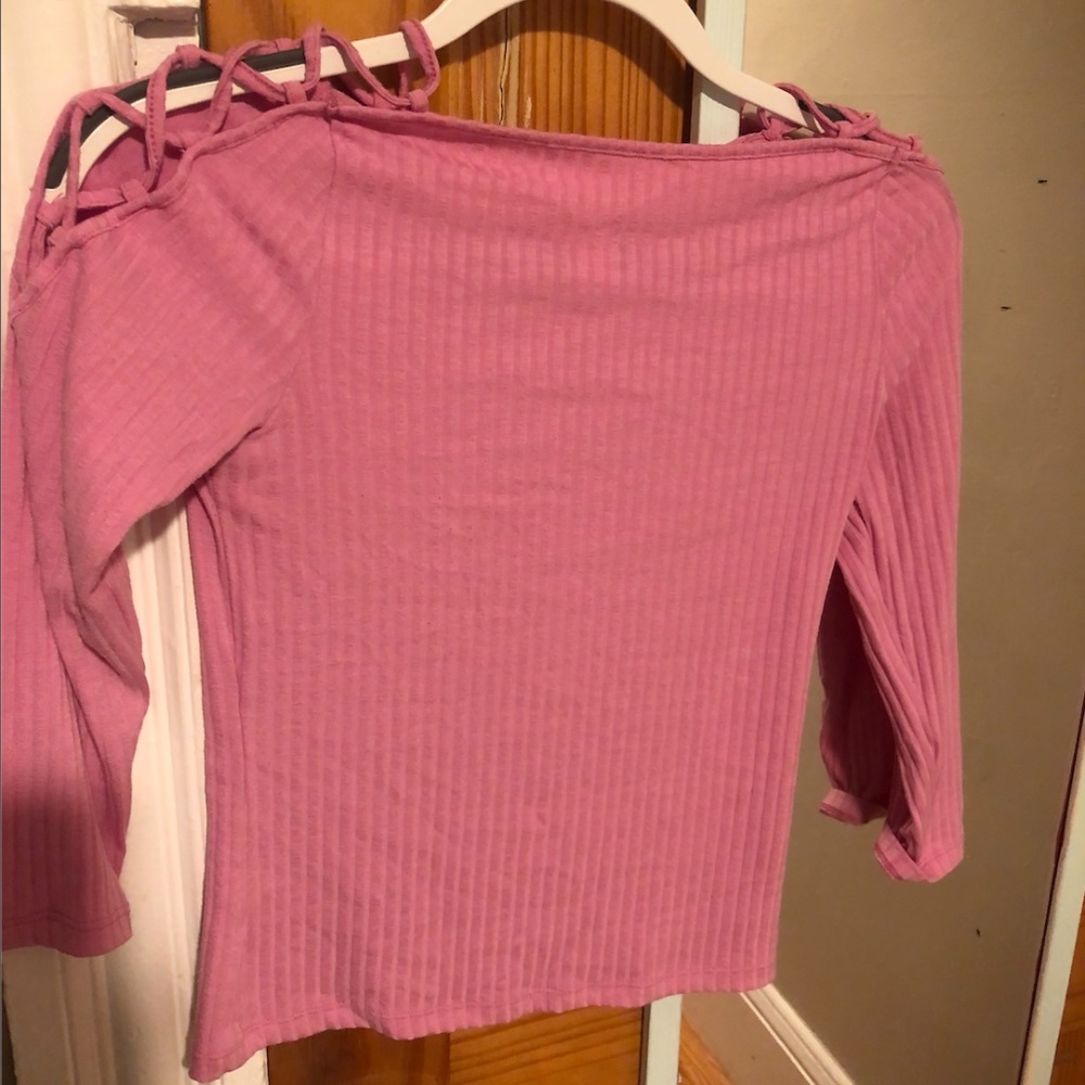 3/4 length pink top with shoulder cut outs